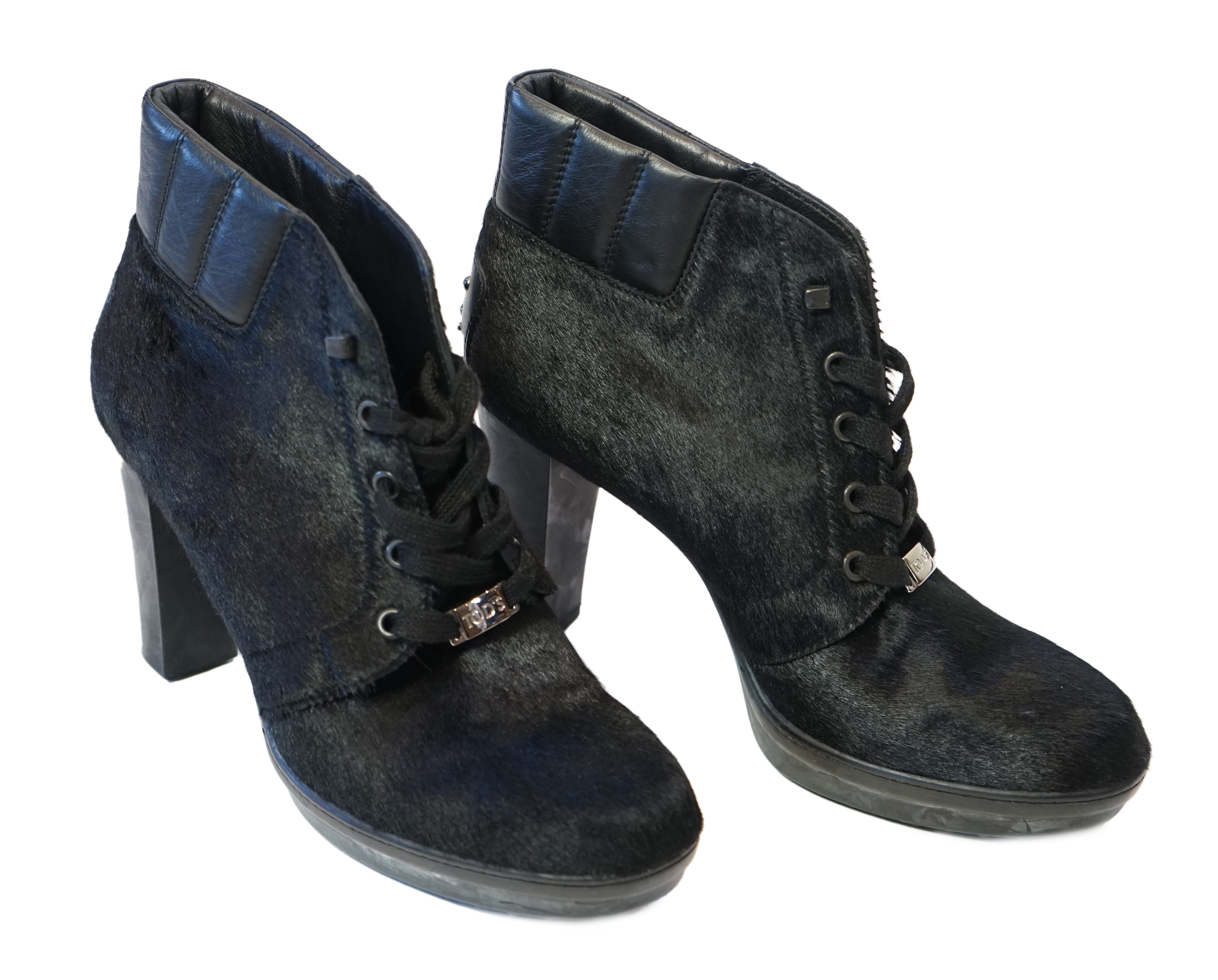 A pair of Tod's black calf hair and leather trim lace up ankle boots, size EU 39